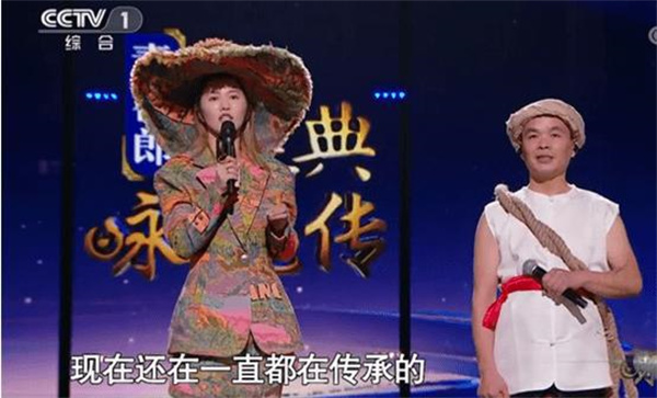 楊興勇在央視《經典詠流傳》與歌手譚維維合作演唱